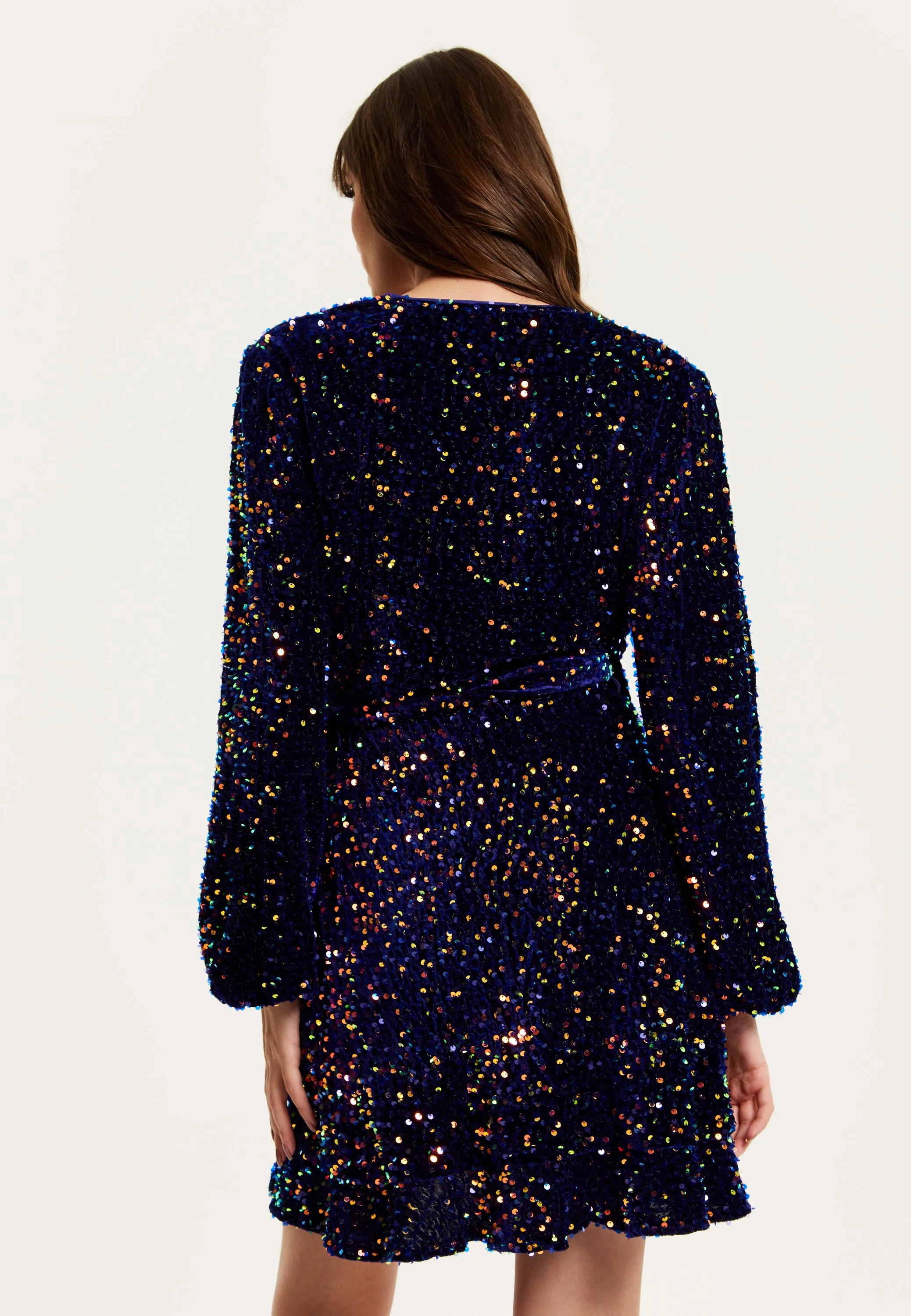 Women's Mini Dress in Royal Blue Velvet with Long Sleeves & Multicolour Sequin Wrap Style - Liquorish